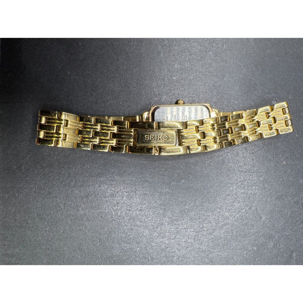 Seiko Tank Watch Women 16mm Champagne Dial Gold Tone Rectangle 1N01-0FH0 - Picture 6 of 8
